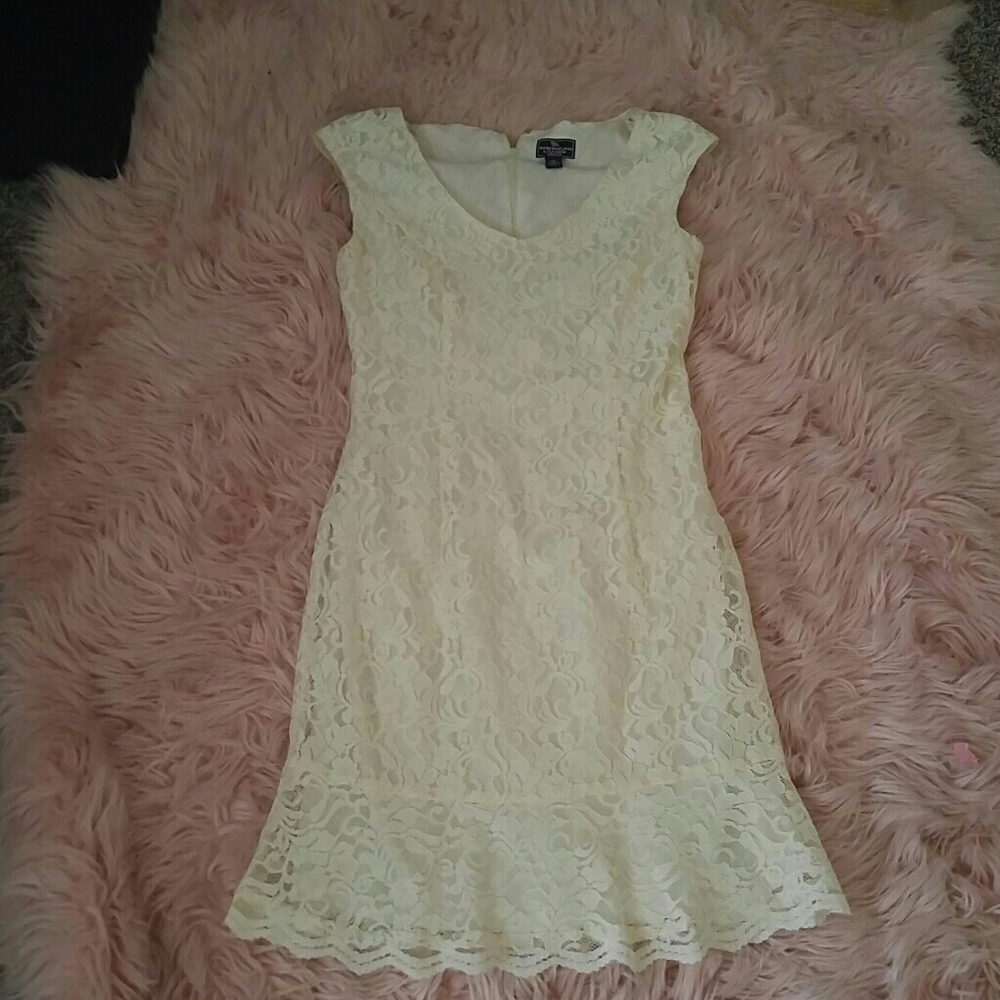 White dress with swirl design.